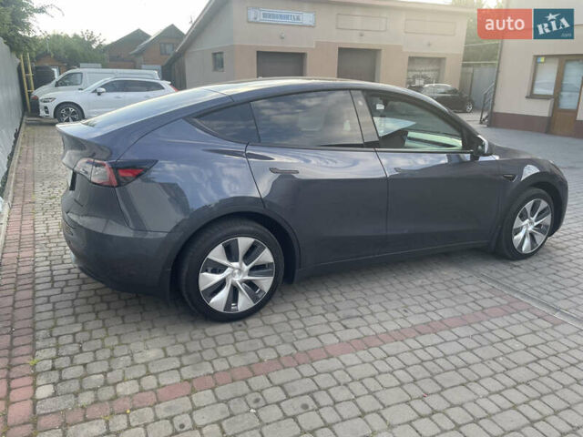 Сірий Тесла Model Y, об'ємом двигуна 0 л та пробігом 59 тис. км за 26900 $, фото 55 на Automoto.ua