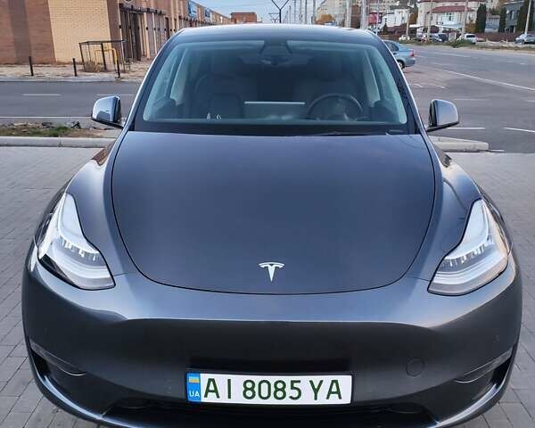 Серый Тесла Model Y, объемом двигателя 0 л и пробегом 74 тыс. км за 26999 $, фото 18 на Automoto.ua