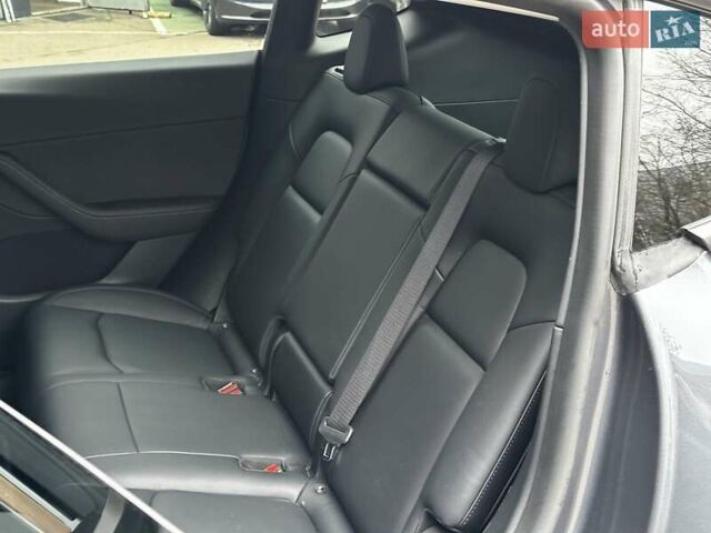 Серый Тесла Model Y, объемом двигателя 0 л и пробегом 34 тыс. км за 31999 $, фото 13 на Automoto.ua