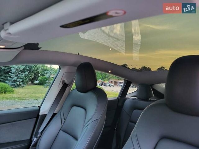 Серый Тесла Model Y, объемом двигателя 0 л и пробегом 49 тыс. км за 26950 $, фото 23 на Automoto.ua