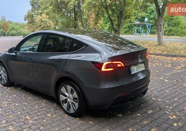 Серый Тесла Model Y, объемом двигателя 0 л и пробегом 115 тыс. км за 26500 $, фото 3 на Automoto.ua