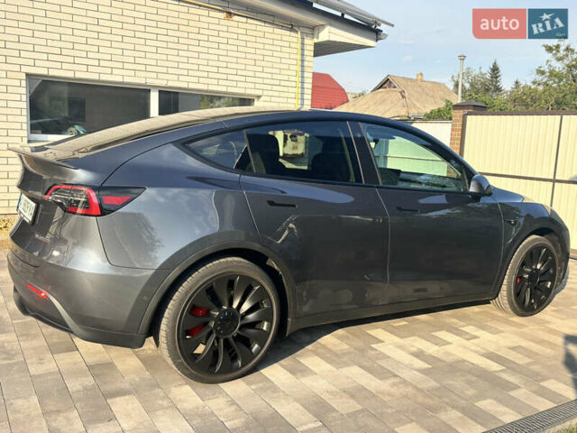 Серый Тесла Model Y, объемом двигателя 0 л и пробегом 65 тыс. км за 29500 $, фото 2 на Automoto.ua