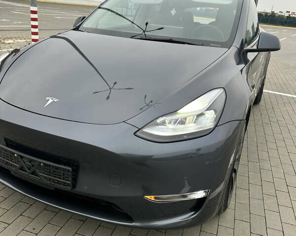 Серый Тесла Model Y, объемом двигателя 0 л и пробегом 58 тыс. км за 28500 $, фото 2 на Automoto.ua