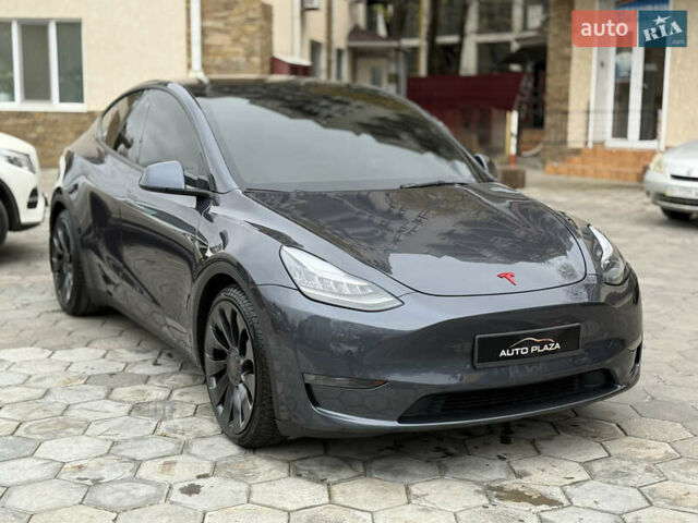 Серый Тесла Model Y, объемом двигателя 0 л и пробегом 53 тыс. км за 28000 $, фото 3 на Automoto.ua