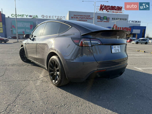Серый Тесла Model Y, объемом двигателя 0 л и пробегом 99 тыс. км за 24999 $, фото 5 на Automoto.ua