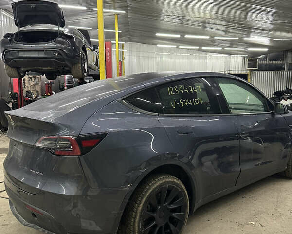 Серый Тесла Model Y, объемом двигателя 0 л и пробегом 73 тыс. км за 23500 $, фото 4 на Automoto.ua