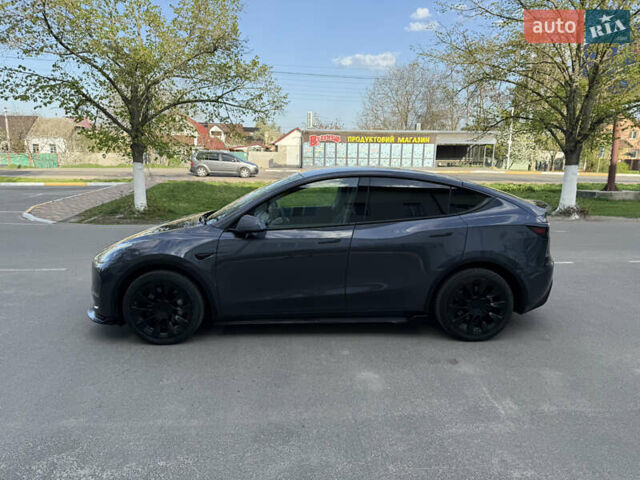 Серый Тесла Model Y, объемом двигателя 0 л и пробегом 83 тыс. км за 24500 $, фото 20 на Automoto.ua