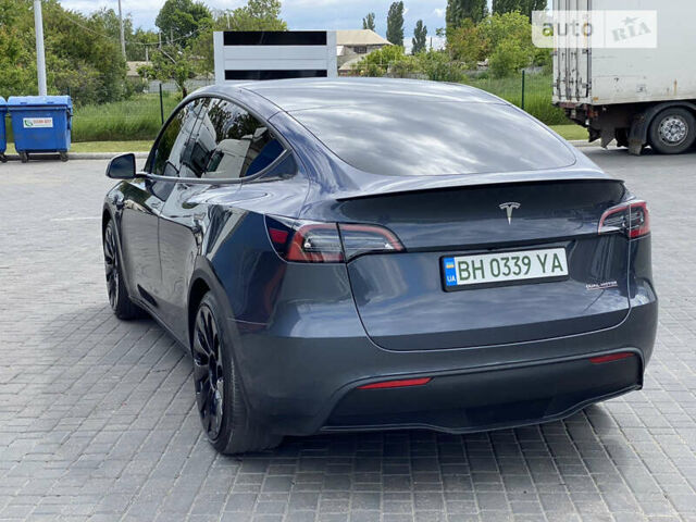 Серый Тесла Model Y, объемом двигателя 0 л и пробегом 112 тыс. км за 34900 $, фото 3 на Automoto.ua