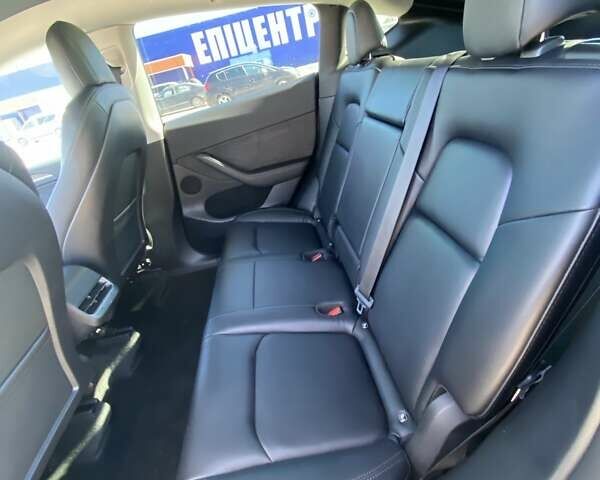 Серый Тесла Model Y, объемом двигателя 0 л и пробегом 32 тыс. км за 27500 $, фото 26 на Automoto.ua