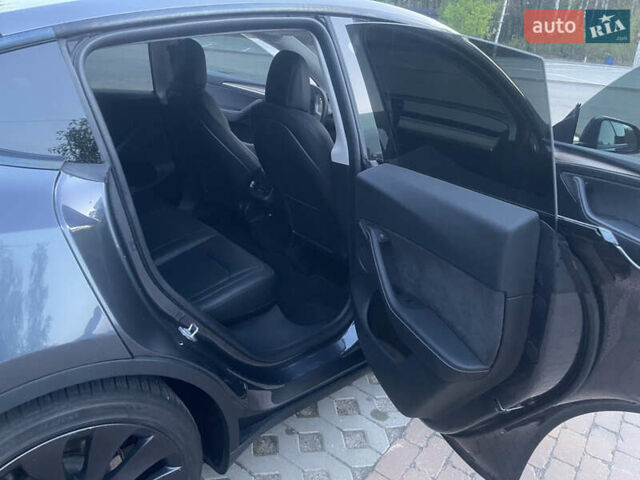Сірий Тесла Model Y, об'ємом двигуна 0 л та пробігом 69 тис. км за 29999 $, фото 14 на Automoto.ua