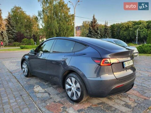 Серый Тесла Model Y, объемом двигателя 0 л и пробегом 49 тыс. км за 26950 $, фото 10 на Automoto.ua