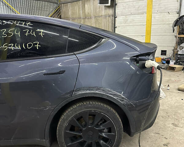 Серый Тесла Model Y, объемом двигателя 0 л и пробегом 73 тыс. км за 23500 $, фото 3 на Automoto.ua