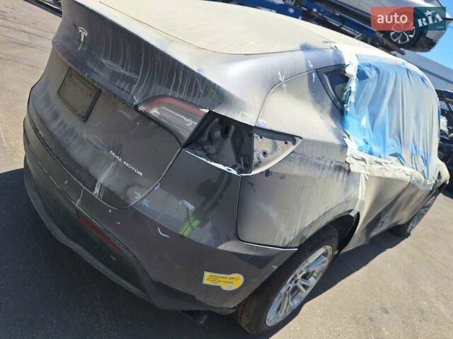Серый Тесла Model Y, объемом двигателя 0 л и пробегом 86 тыс. км за 17300 $, фото 5 на Automoto.ua