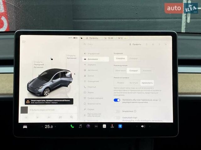 Серый Тесла Model Y, объемом двигателя 0 л и пробегом 61 тыс. км за 30999 $, фото 17 на Automoto.ua