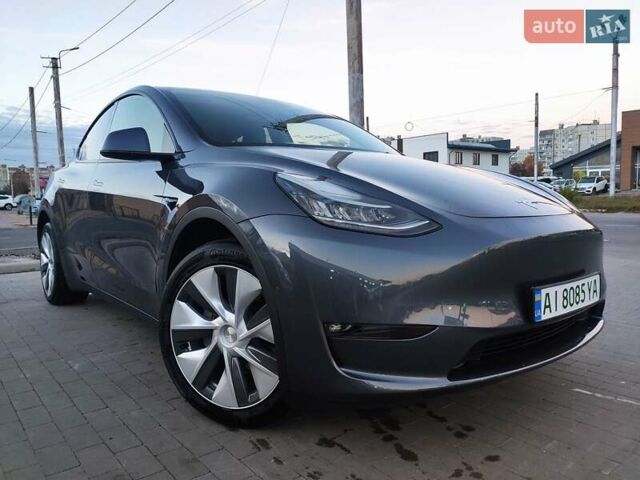 Серый Тесла Model Y, объемом двигателя 0 л и пробегом 74 тыс. км за 26999 $, фото 4 на Automoto.ua