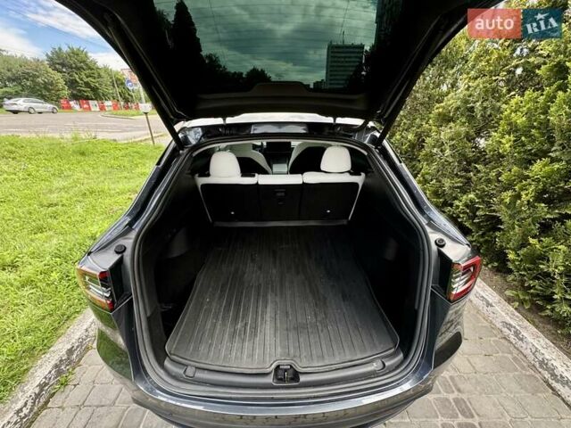 Серый Тесла Model Y, объемом двигателя 0 л и пробегом 28 тыс. км за 40865 $, фото 5 на Automoto.ua