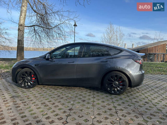 Серый Тесла Model Y, объемом двигателя 0 л и пробегом 53 тыс. км за 31500 $, фото 14 на Automoto.ua