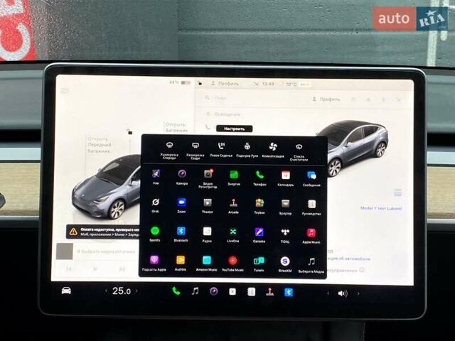 Серый Тесла Model Y, объемом двигателя 0 л и пробегом 61 тыс. км за 30999 $, фото 22 на Automoto.ua