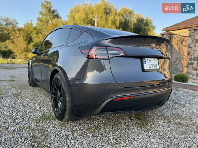 Серый Тесла Model Y, объемом двигателя 0 л и пробегом 112 тыс. км за 27700 $, фото 18 на Automoto.ua