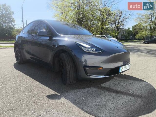 Серый Тесла Model Y, объемом двигателя 0 л и пробегом 77 тыс. км за 30999 $, фото 1 на Automoto.ua