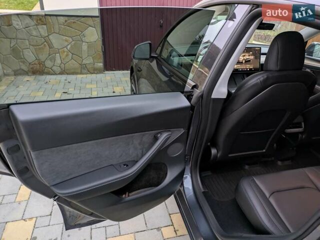 Серый Тесла Model Y, объемом двигателя 0 л и пробегом 27 тыс. км за 25900 $, фото 8 на Automoto.ua