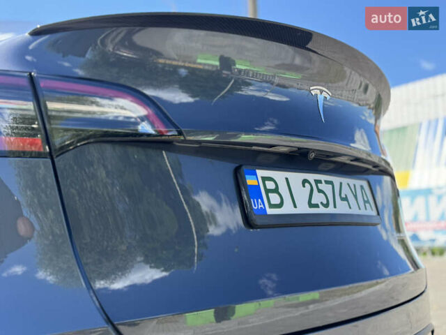 Серый Тесла Model Y, объемом двигателя 0 л и пробегом 5 тыс. км за 27950 $, фото 10 на Automoto.ua