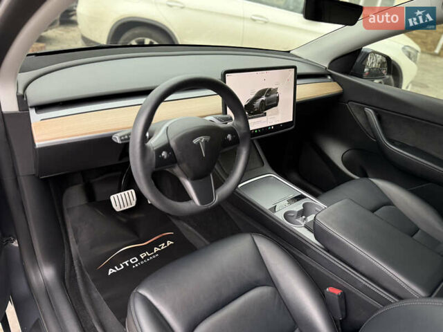 Серый Тесла Model Y, объемом двигателя 0 л и пробегом 53 тыс. км за 28000 $, фото 42 на Automoto.ua