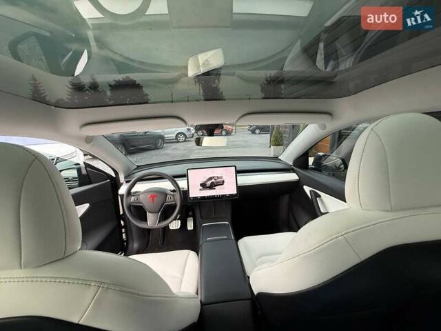 Серый Тесла Model Y, объемом двигателя 0 л и пробегом 85 тыс. км за 23900 $, фото 50 на Automoto.ua