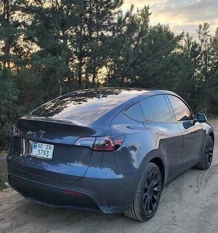 Серый Тесла Model Y, объемом двигателя 0 л и пробегом 20 тыс. км за 27000 $, фото 1 на Automoto.ua