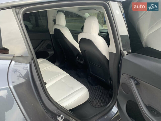 Серый Тесла Model Y, объемом двигателя 0 л и пробегом 29 тыс. км за 32700 $, фото 14 на Automoto.ua