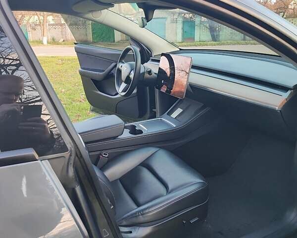 Серый Тесла Model Y, объемом двигателя 0 л и пробегом 160 тыс. км за 24500 $, фото 19 на Automoto.ua
