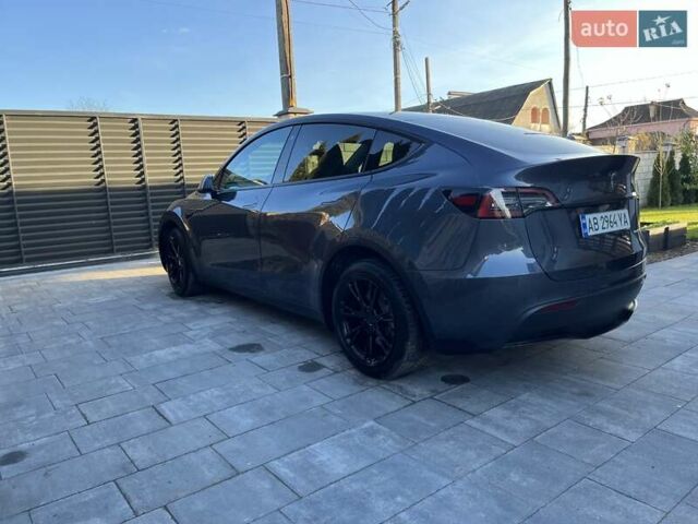 Серый Тесла Model Y, объемом двигателя 0 л и пробегом 23 тыс. км за 29900 $, фото 5 на Automoto.ua