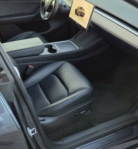 Серый Тесла Model Y, объемом двигателя 0 л и пробегом 77 тыс. км за 25499 $, фото 9 на Automoto.ua