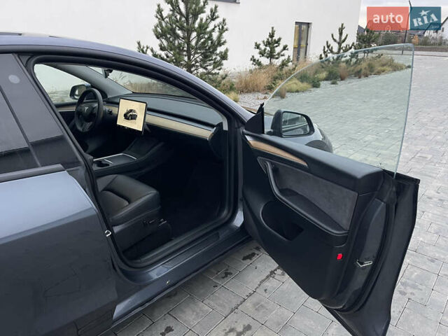 Сірий Тесла Model Y, об'ємом двигуна 0 л та пробігом 65 тис. км за 25500 $, фото 26 на Automoto.ua