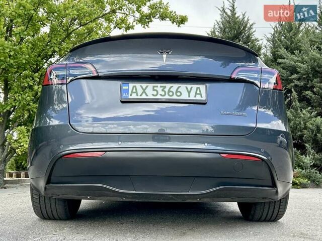 Серый Тесла Model Y, объемом двигателя 0 л и пробегом 56 тыс. км за 28500 $, фото 5 на Automoto.ua