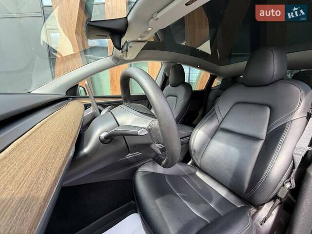 Серый Тесла Model Y, объемом двигателя 0 л и пробегом 93 тыс. км за 23400 $, фото 11 на Automoto.ua