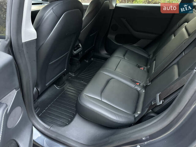 Серый Тесла Model Y, объемом двигателя 0 л и пробегом 95 тыс. км за 24900 $, фото 8 на Automoto.ua