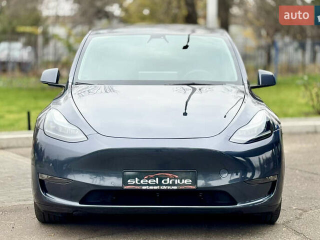 Серый Тесла Model Y, объемом двигателя 0 л и пробегом 130 тыс. км за 25999 $, фото 1 на Automoto.ua