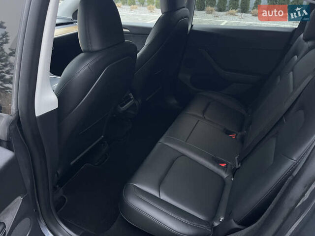Сірий Тесла Model Y, об'ємом двигуна 0 л та пробігом 65 тис. км за 25500 $, фото 29 на Automoto.ua