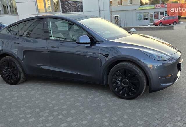 Серый Тесла Model Y, объемом двигателя 0 л и пробегом 77 тыс. км за 25499 $, фото 5 на Automoto.ua