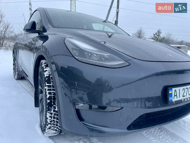 Серый Тесла Model Y, объемом двигателя 0 л и пробегом 54 тыс. км за 26900 $, фото 3 на Automoto.ua