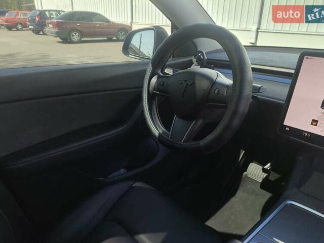 Серый Тесла Model Y, объемом двигателя 0 л и пробегом 77 тыс. км за 30999 $, фото 31 на Automoto.ua