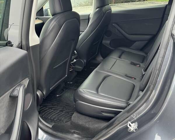 Серый Тесла Model Y, объемом двигателя 0 л и пробегом 61 тыс. км за 25500 $, фото 23 на Automoto.ua