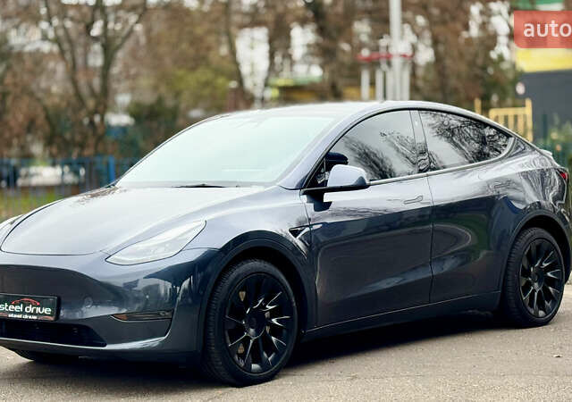 Серый Тесла Model Y, объемом двигателя 0 л и пробегом 130 тыс. км за 25999 $, фото 4 на Automoto.ua
