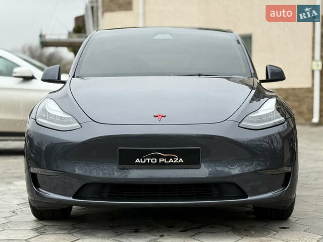 Серый Тесла Model Y, объемом двигателя 0 л и пробегом 53 тыс. км за 28000 $, фото 2 на Automoto.ua