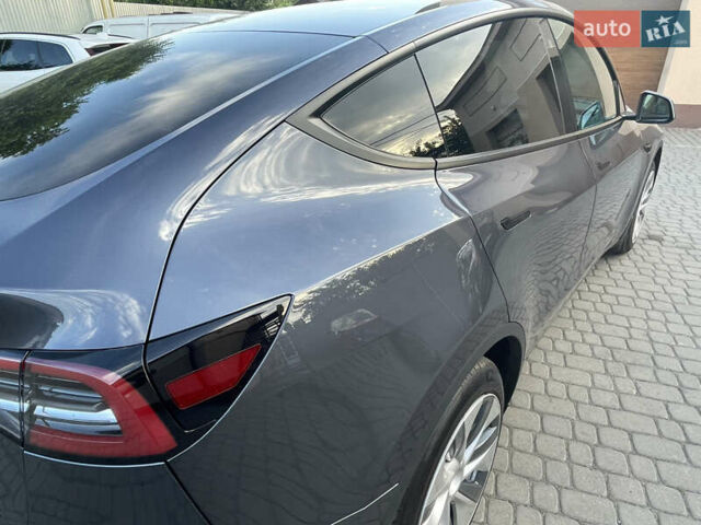 Сірий Тесла Model Y, об'ємом двигуна 0 л та пробігом 59 тис. км за 26900 $, фото 35 на Automoto.ua