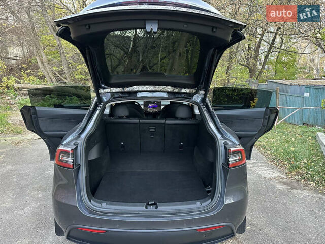Серый Тесла Model Y, объемом двигателя 0 л и пробегом 95 тыс. км за 24900 $, фото 7 на Automoto.ua