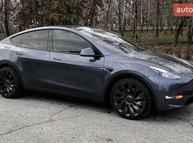 Серый Тесла Model Y, объемом двигателя 0 л и пробегом 82 тыс. км за 26500 $, фото 4 на Automoto.ua