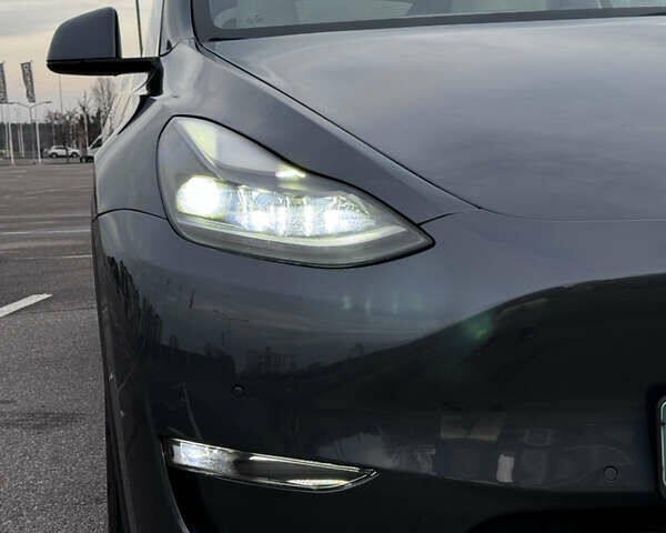 Серый Тесла Model Y, объемом двигателя 0 л и пробегом 26 тыс. км за 28900 $, фото 57 на Automoto.ua