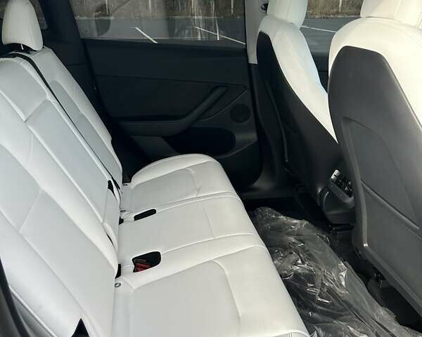 Серый Тесла Model Y, объемом двигателя 0 л и пробегом 47 тыс. км за 26900 $, фото 11 на Automoto.ua